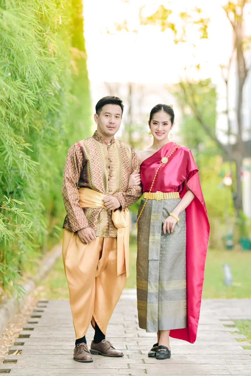 Child in beautiful pink Thai dress — family photoshoot