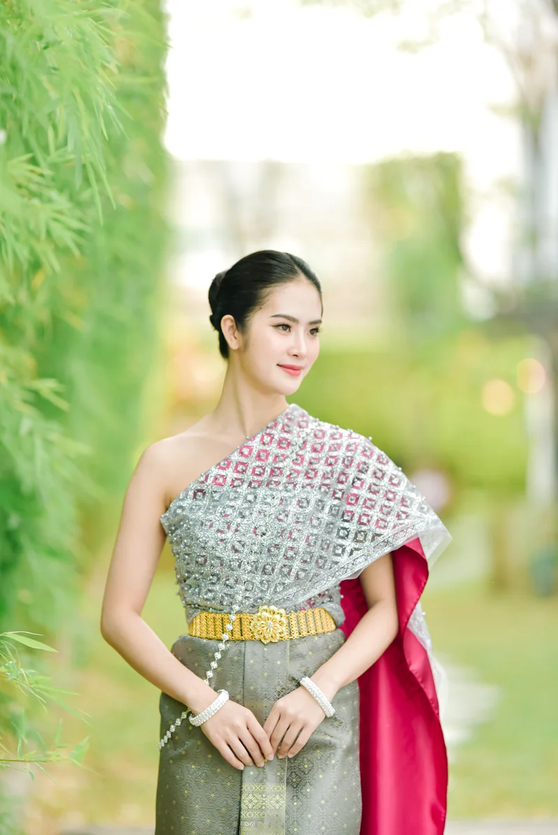 Silver gray Thai dress in garden setting — Sabai Thai Dressing